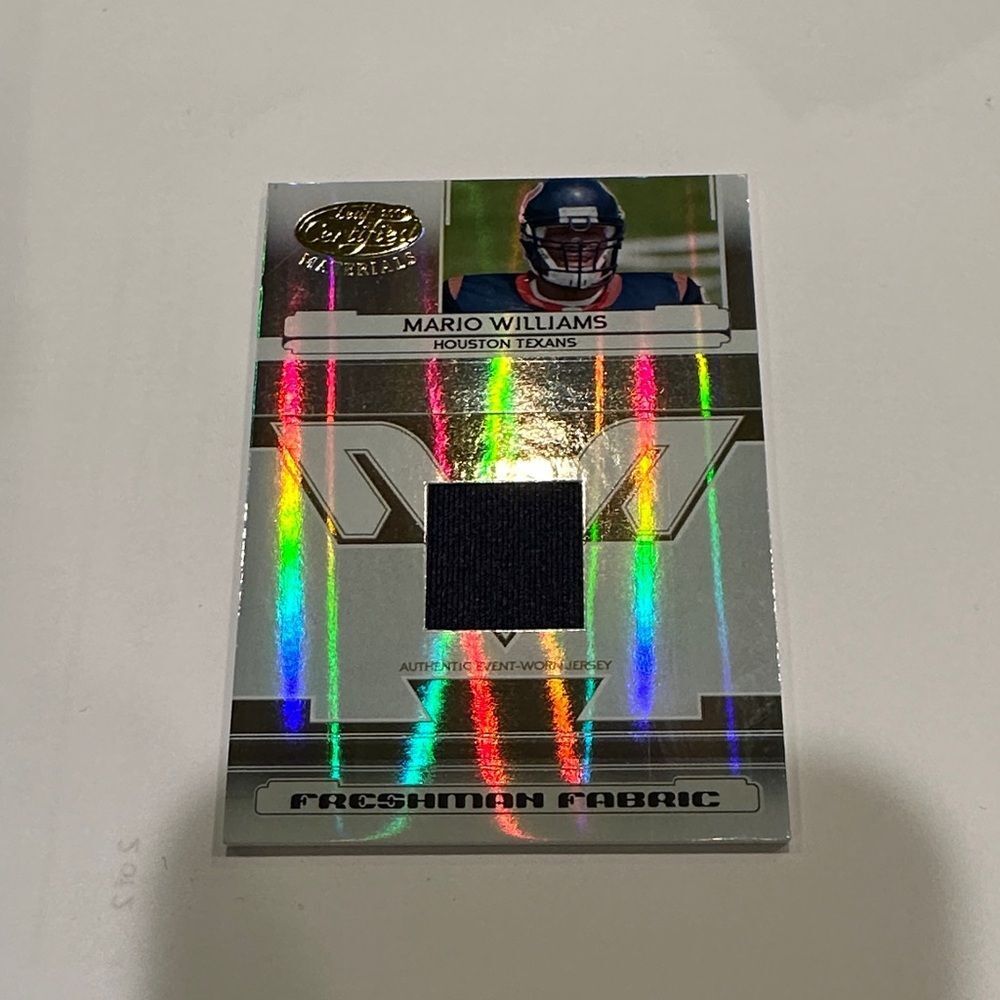 Holographic Football Trading Card with Black Fabric of Mario Williams mint con
